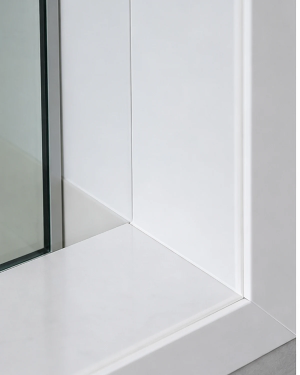 Detail of smooth PVC panel, finishing profile and sealed connection